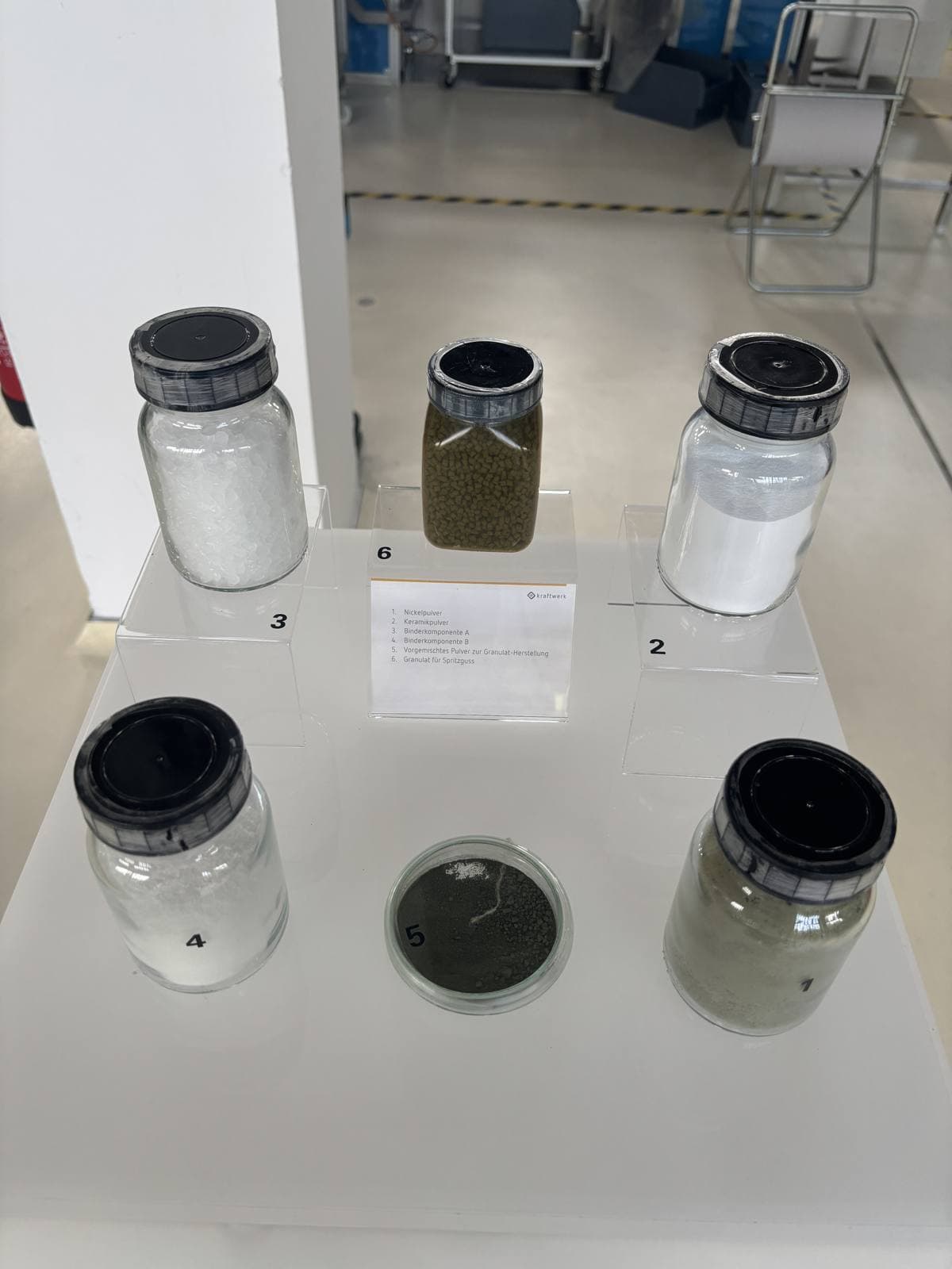 Jars of the raw ceramic materials used for the cell layers in Dresden